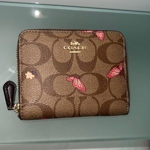Coach zip wallet with butterflies